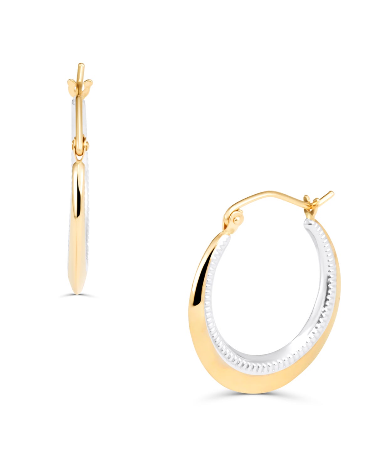 ARRACADAS DE ORO AMARILLO Y BLANCO 14K: Arracadas de oro amarillo y blanco de 14 kilates con diseño bicolor y forma ovalada. Unas joyas versátiles y chic.
