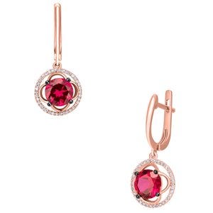 Aretes de oro rosa con rubí