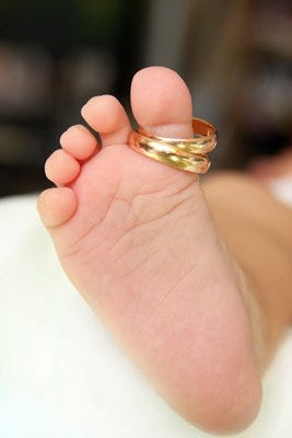 Argollas de matrimonio y bebé